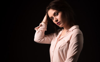 Woman pink shirt holding hair - her side free wallpaper