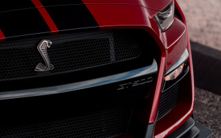 Red sports car black stripe - detailed face free wallpaper