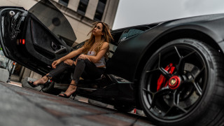 Woman sitting black sports car - the door free wallpaper