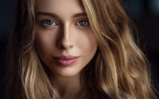 Blonde woman serious portrait photorealism - free portrait wallpaper for desktop