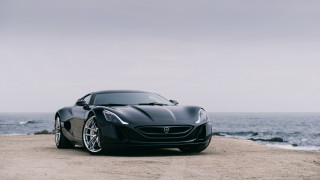 Black sports car beach ocean - a beach near the ocean free wallpaper