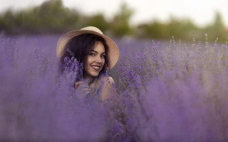 Lavender field woman hat smile - her hand behind her back free wallpaper
