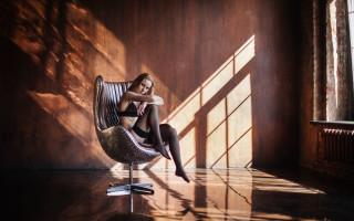 Woman sitting chair room window - a chair in a room free wallpaper