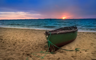 Beach sunset boat sand sky - the background and a boat free wallpaper for desktop