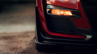 Red car light side mirror - sharp detail free wallpaper