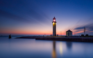 Lighthouse night colorful sky mystical - a colorful sky in the background free wallpaper