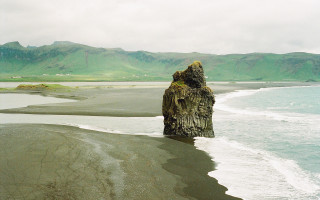 Rock water beach mountain sky - color film photography free wallpaper