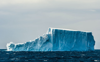 Iceberg ocean boat sky mountain - sharp edge free wallpaper