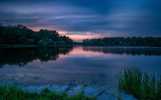 Lake sunset clouds mountains forest - the water and a sunset in the background free wallpaper