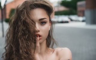 Woman long hair street portrait - a street corner free wallpaper