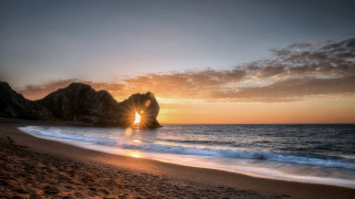 Sunset beach rock formation water 4 - david martin free wallpaper for desktop