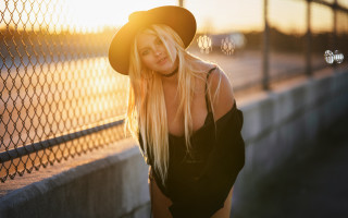 Blonde woman sunset fence hat - a fence free wallpaper