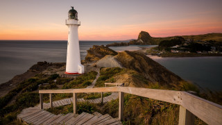 Lighthouse cliff sunset wooden staircase - a wooden staircase free wallpaper