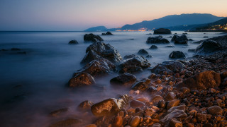 Rocky beach mountain dusk water - cinematic landscape free wallpaper for desktop