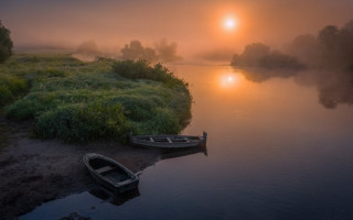 Boat shore river sunset fog 2 - the sun in the distance free wallpaper