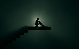 Man sitting stair dark light - liminal free wallpaper