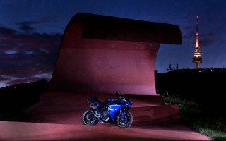 Motorcycle cityscape night tower sky - a motorcycle free wallpaper