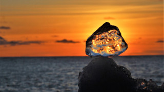 Glowing rock sunset ocean orange - free light wallpaper