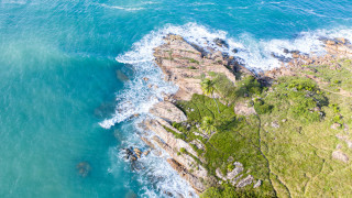 Rocky coastline aerial island water - a rocky coastline free wallpaper