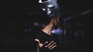 Masked man hands out dark - a mask free wallpaper