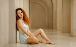 Woman sitting hallway photorealistic portrait - the camera free wallpaper for desktop