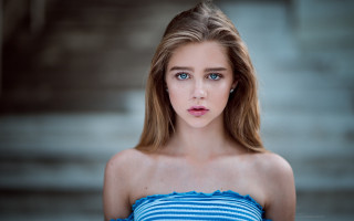 Blue eyes blonde woman staircase - a white background free wallpaper