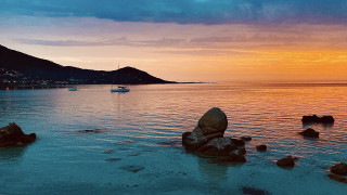Boat rocky shore sunset mountain - affinity photo free wallpaper for desktop