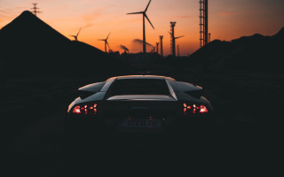 Car windmill sunset orange sky - a windmill free wallpaper