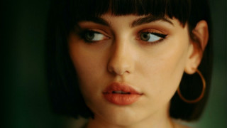 Woman hoop ears green background - annabel eyres free wallpaper