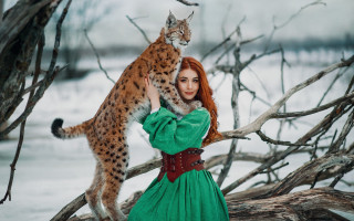 Woman green dress cat snow - a green dress holding free wallpaper