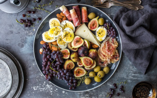 Eggs cheese fruit crackers fork - a plate of food free wallpaper