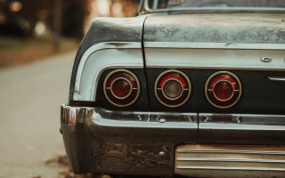 Car rear closeup forest background - the background and a person free wallpaper