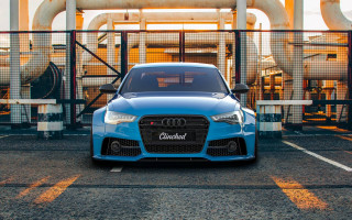 Blue car parking lot fence - a fence and a building free wallpaper