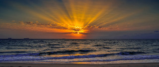 Sunset ocean boat sky crepuscular - a boat in the distance free wallpaper