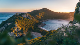 Mountain lake beach city lights - the middle of it free wallpaper