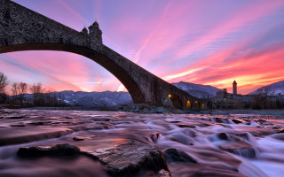 Bridge river pink sky clock - andrea pozzo free wallpaper