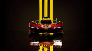 Red race car yellow stripe - a red race car free wallpaper