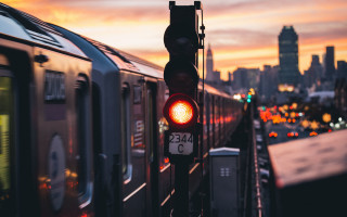 Train city sunset blurry background - a city skyline in the background free wallpaper