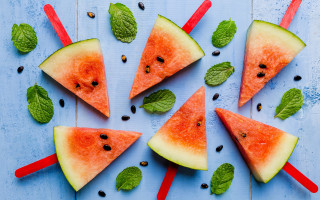 Watermelon slices mint leaves blue - a blue surface free wallpaper for desktop