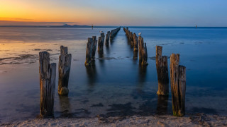 Pier beach ocean sunset boat - a long wooden pier free wallpaper