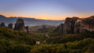 Scenic valley mountains sunset village - a scenic view of a valley free wallpaper for desktop