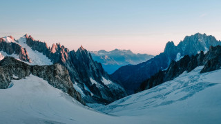 Mountain range snowy peaks pink - camille bouvagne free wallpaper