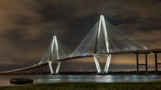 Large bridge night water clouds - a large bridge over a body of water free wallpaper