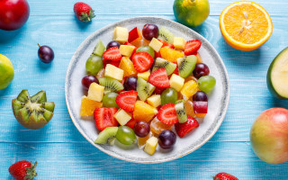 Bowl fruit surrounded blue tablecloth - a bowl of fruit free wallpaper for desktop