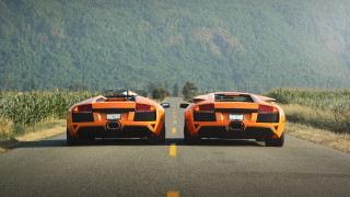 Orange sports cars cornfield mountain - the side of a road next free wallpaper for desktop