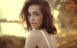 Woman frizzy hair tree water - a sunset in the background free wallpaper for desktop