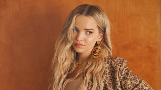 Woman leopard jacket earrings portrait - constance gordoncumming free wallpaper