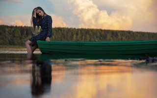 Woman green boat water forest - a forest in the background free wallpaper