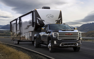 Truck trailer highway mountains clouds - a highway free wallpaper
