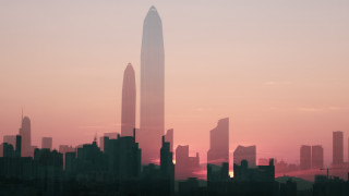 City skyline sunset retrofuturism solarpunk - a tall building in the background free wallpaper